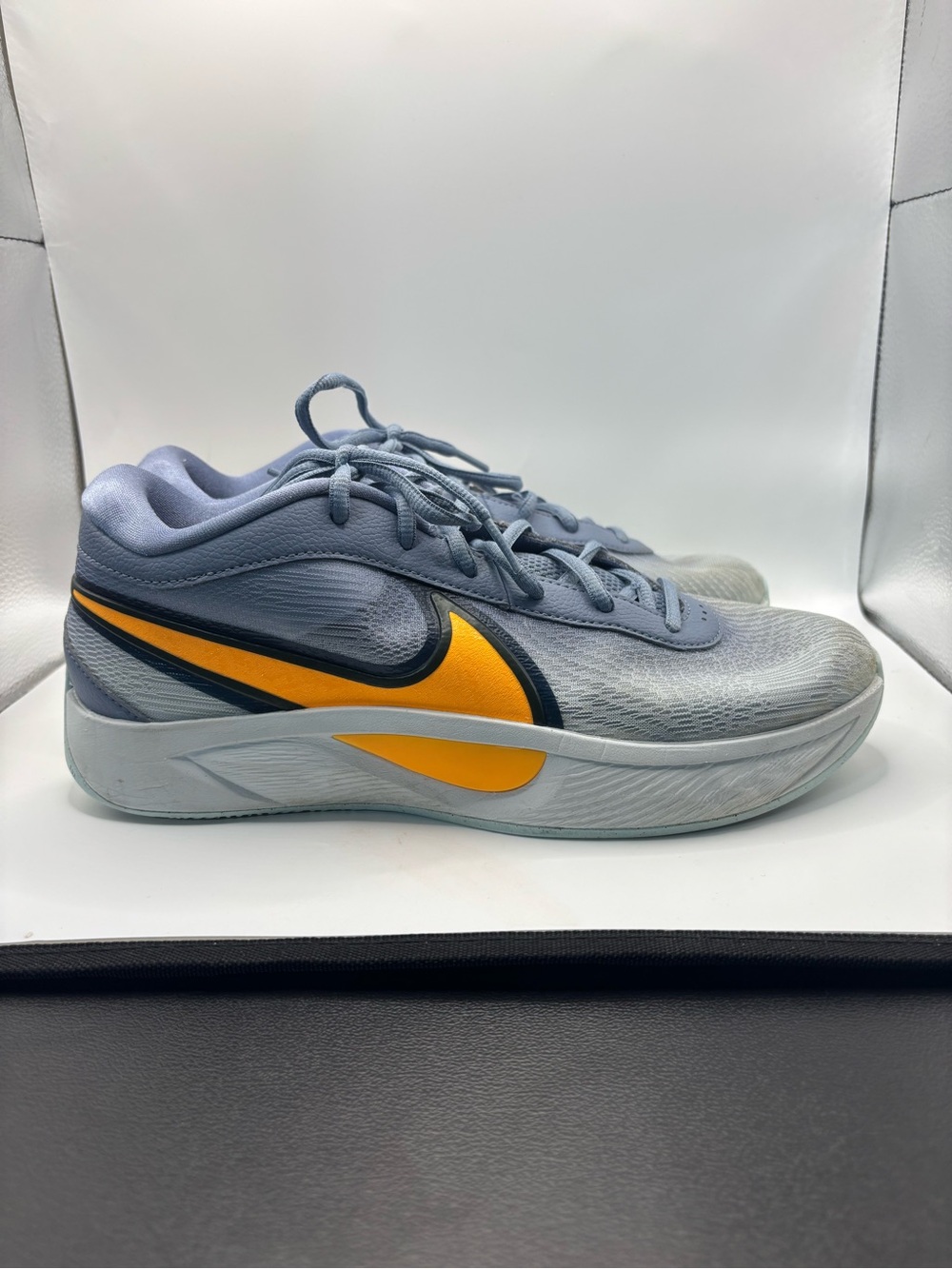 Nike Giannis Freak 6 in the "Ashen Slate / Laser Orange" colorway